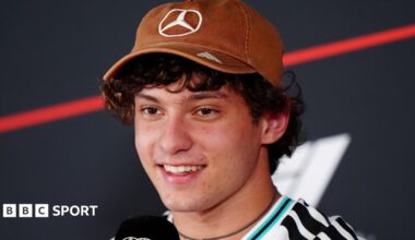 Kimi Antonelli smiling in an official news conference at the United States Grand Prix