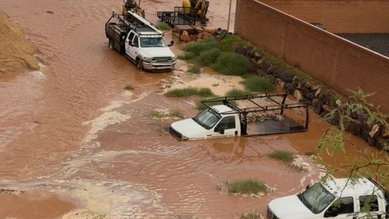 This screengrab taken from video made with a smartphone and provided by Chelsey Field shows flooding on her neighbor's property Thursday, Oct. 22, 2026, in Hurricane, Utah. (Chelsey Field via AP)