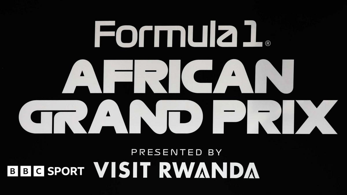 A sign with the wording Formula 1 African Grand Prix presented by Visit Rwanda in white on a black background