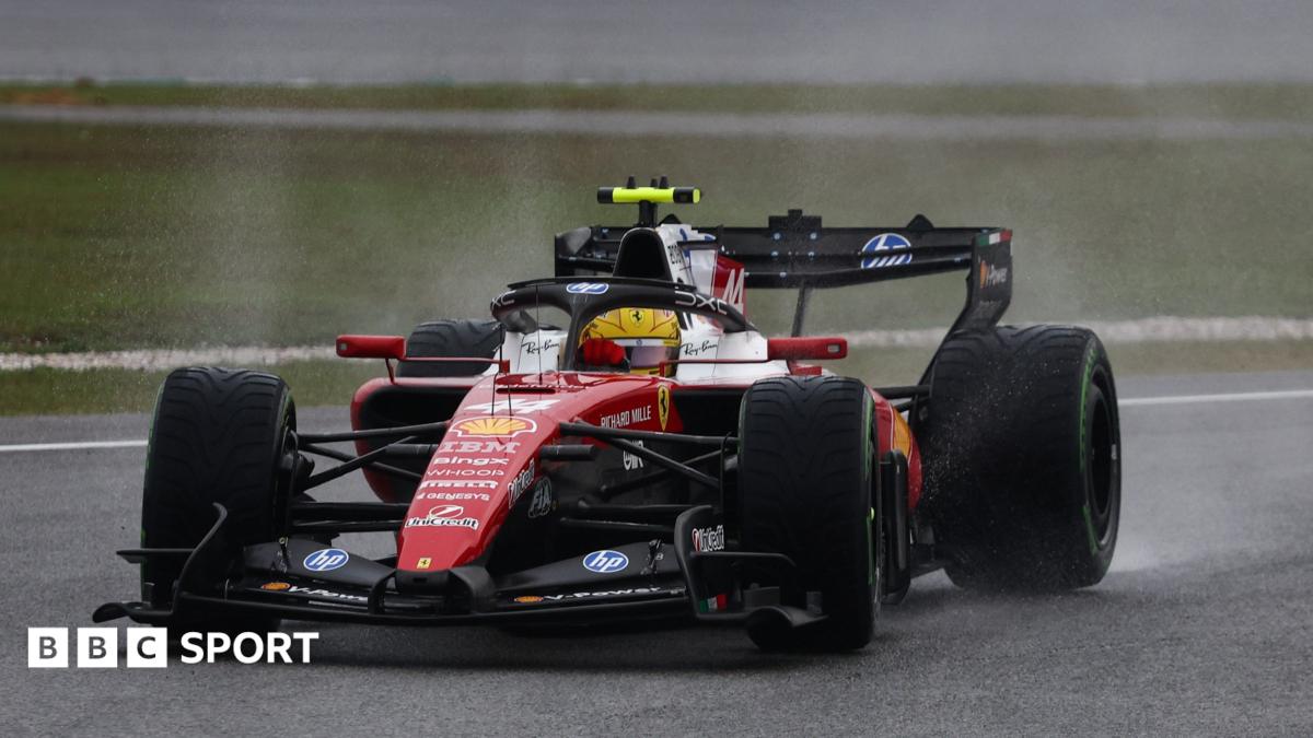 Ferrari's Lewis Hamilton throws up spray during the aborted formation laps at the Bahrian Grand Prix in Malaysia