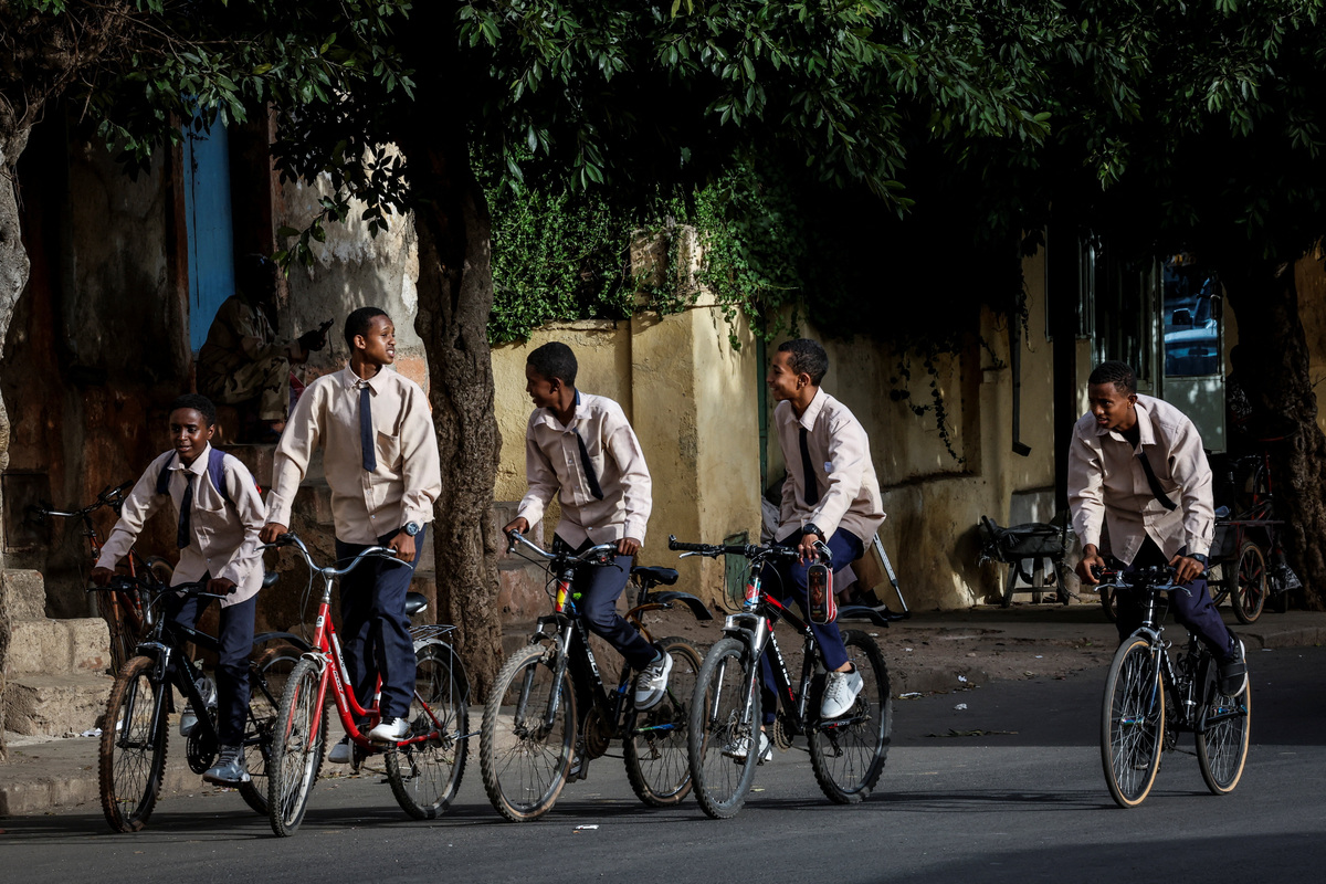 Boys ride bicycles along a street in downtown Asmara after school, Eritrea, June 17, 2026. Eritrea has long been isolated by the West, which views the East African country as among the most repressive in the world, while the government in Asmara has itself pursued a policy of political and economic seclusion. Despite its small population, Eritrea has gained new geopolitical importance this year, during the Iran war, because of its 1,000-km Red Sea coastline along a key shipping route between the Mediterranean and Asia. As conflict disrupted traffic through the Strait of Hormuz and attacks by Iran-backed Houthi militants threatened vessels near Yemen, Eritrean waters emerged as potentially one of the safest corridors for maritime trade. REUTERS/Monicah Mwangi