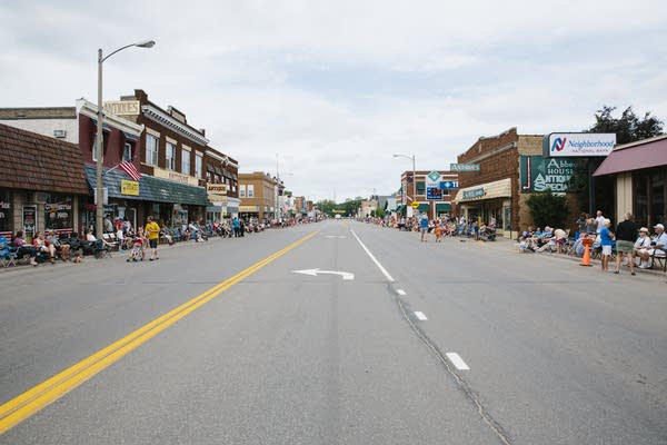 A view of a downtown small town in rural Minnesota from the center of the street.