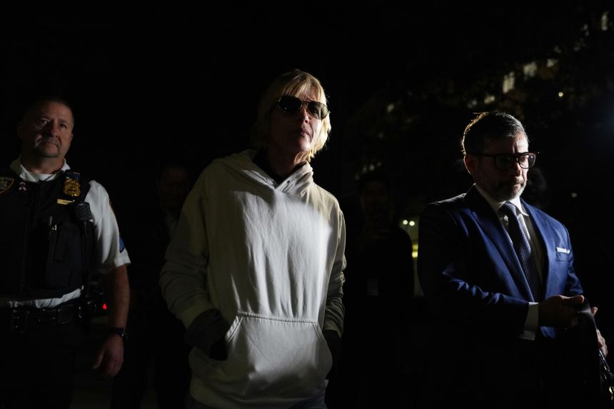 Selma Blair leaves court on Monday in New York after her arraignment on charges of injuring two flight attendants during a cross-country flight. (AP Photo/Ryan Murphy)