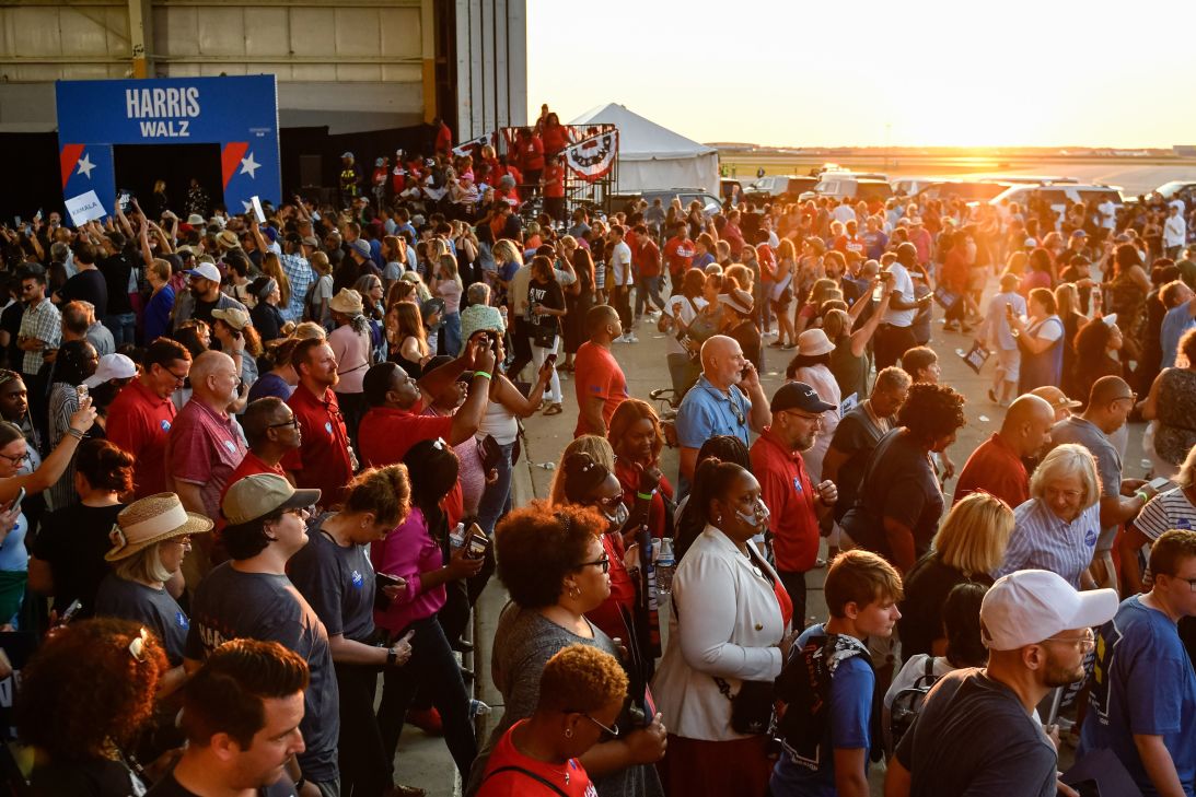 Attendees begin to exit the Signature Aviation Hanger as Vice President Kamala Harris and Governor Tim Walz's presidential campaign rally at Detroit Metropolitan Wayne County Airport in Romulus, Michigan on August 7, 2024 concludes.