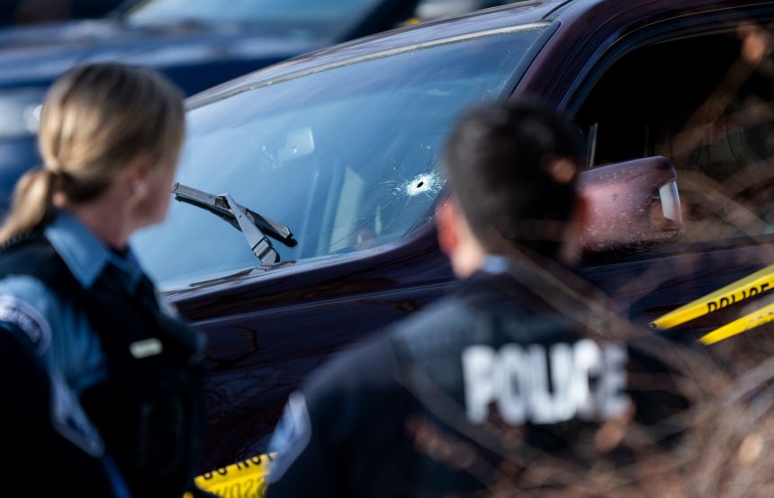 A bullet hole is seen in the windshield of Good's vehicle after it crashed and came to a stop January 7.