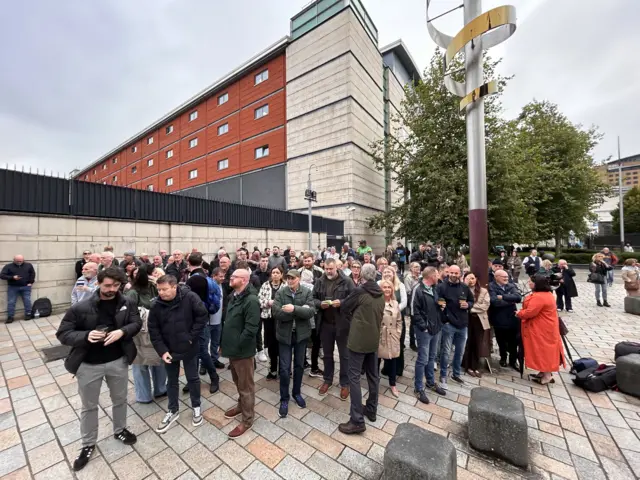Garvaghy Road residents and supporters have gathered outside the court in Belfast