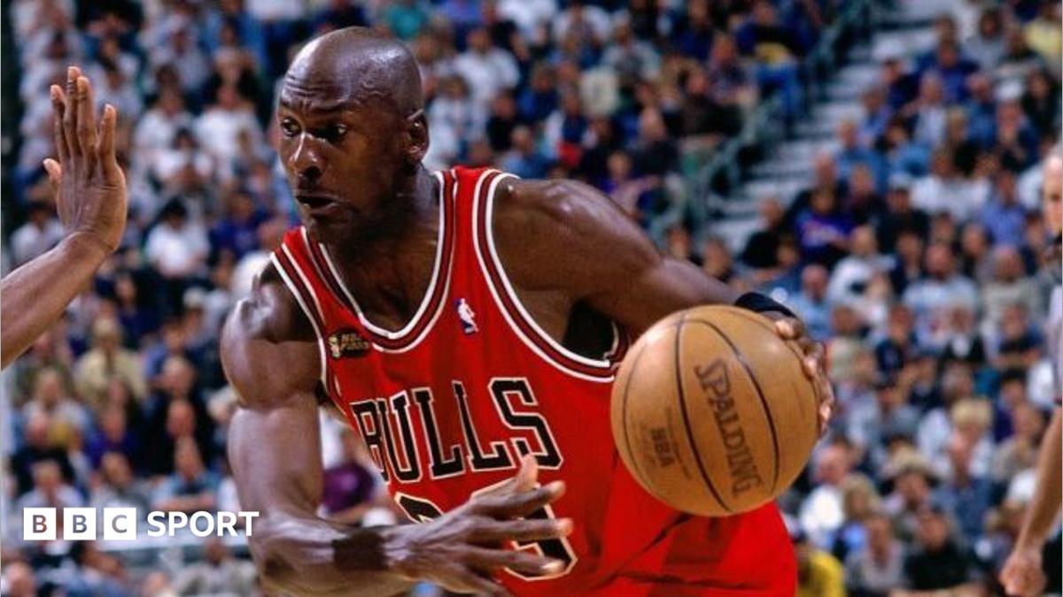 Michael Jordan of the Chicago Bulls drives to the basket during game two of the 1998 NBA Finals against the Utah Jazz on 5 June 1998