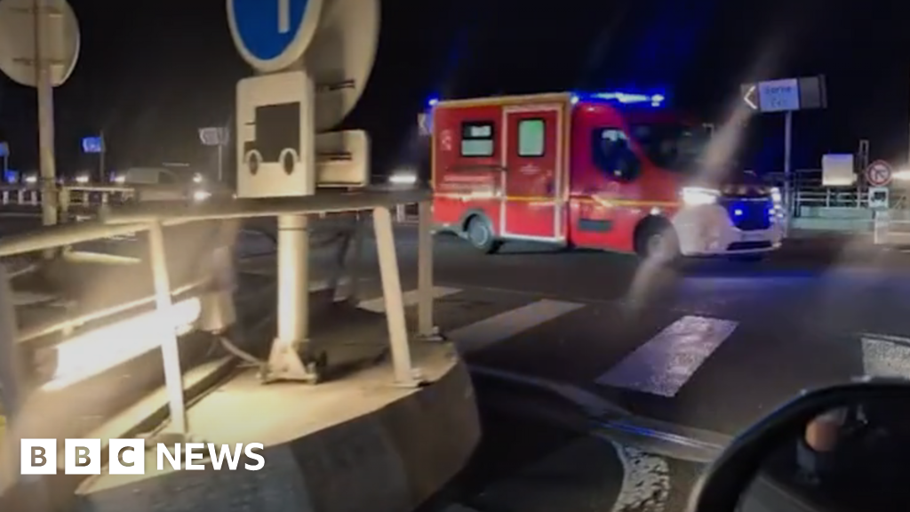 Bus hits train stopped on French side of Channel Tunnel, with 19 injured - BBC