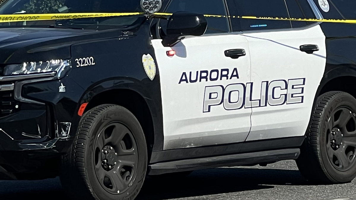 Aurora Police vehicle at crime scene