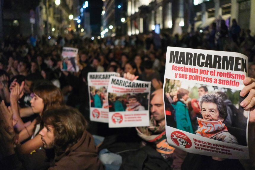 Protesters gather near the Spanish Parliament in Madrid, on Wednesday, October 7, following the death of Maria del Carmen Abascal.