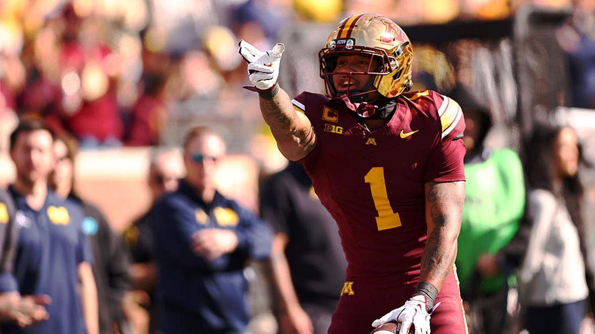 Darius Taylor celebrates during the first quarter at TCF Bank Stadium.