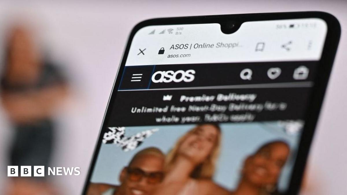 Asos website on smartphone screen.