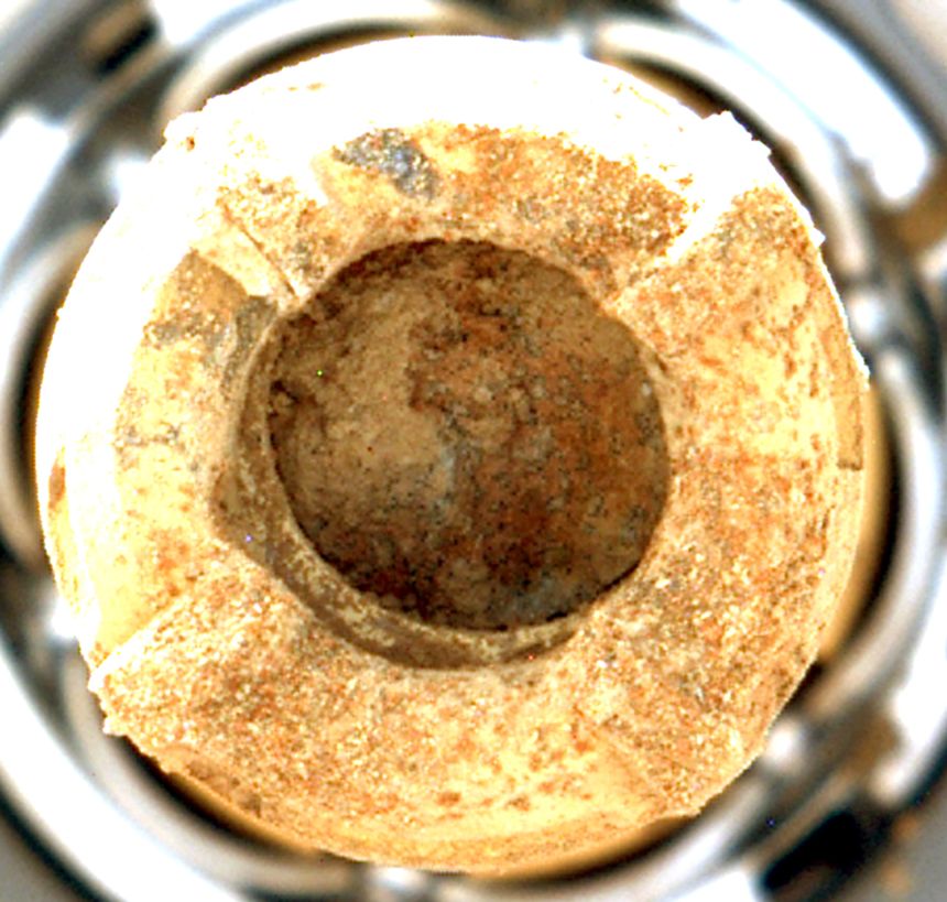 The Cheyava Falls rock sample is seen within the rover’s drill bit before being sealed.