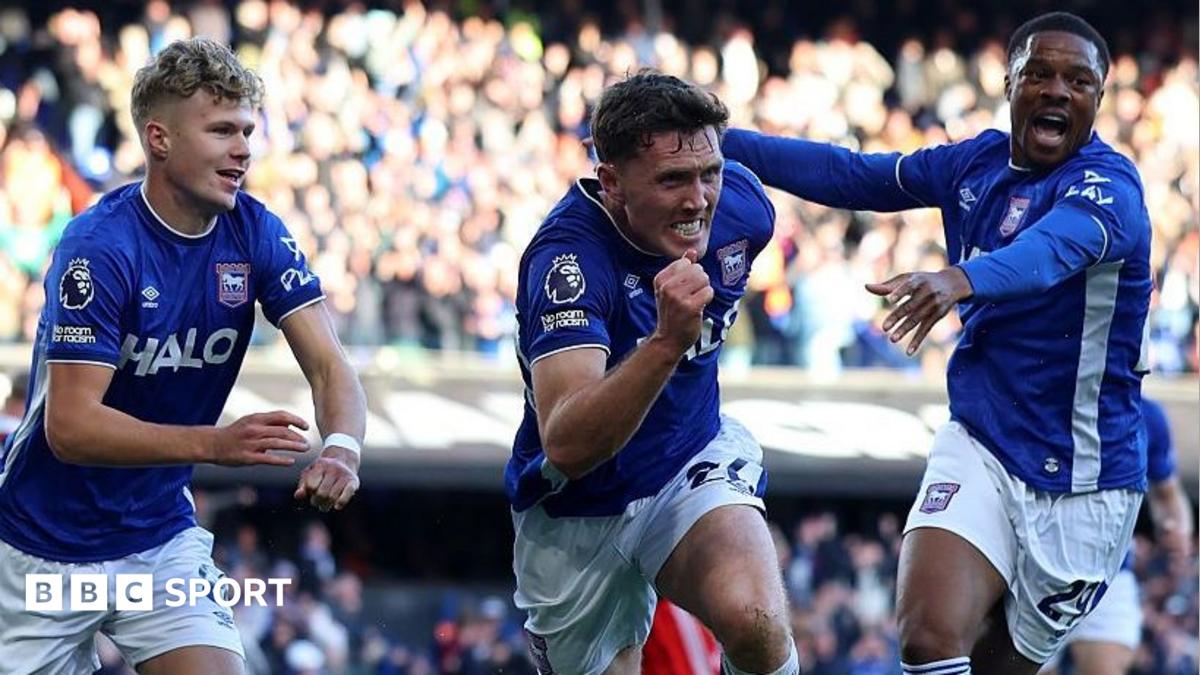 Ipswich players celebrate scoring against Fulham