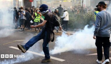 France school protests: Police fire tear gas at crowds as tens of thousands join school demonstrations