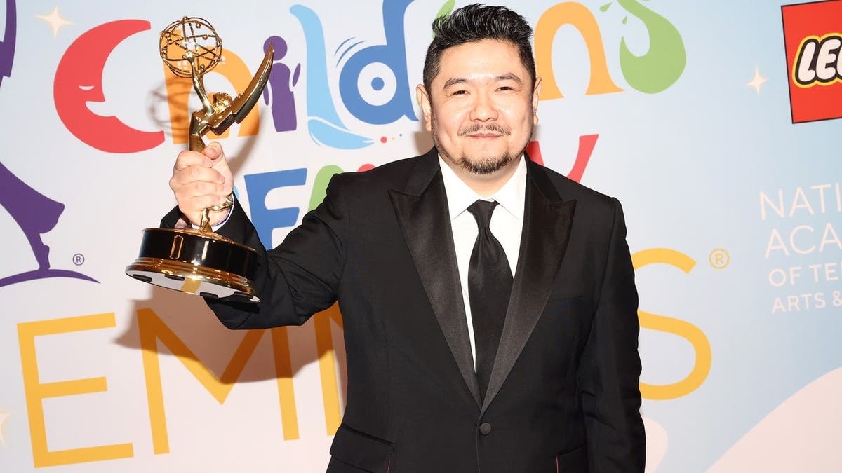 Eric Bauza poses in the press room during the 2022 Children's & Family Emmys.