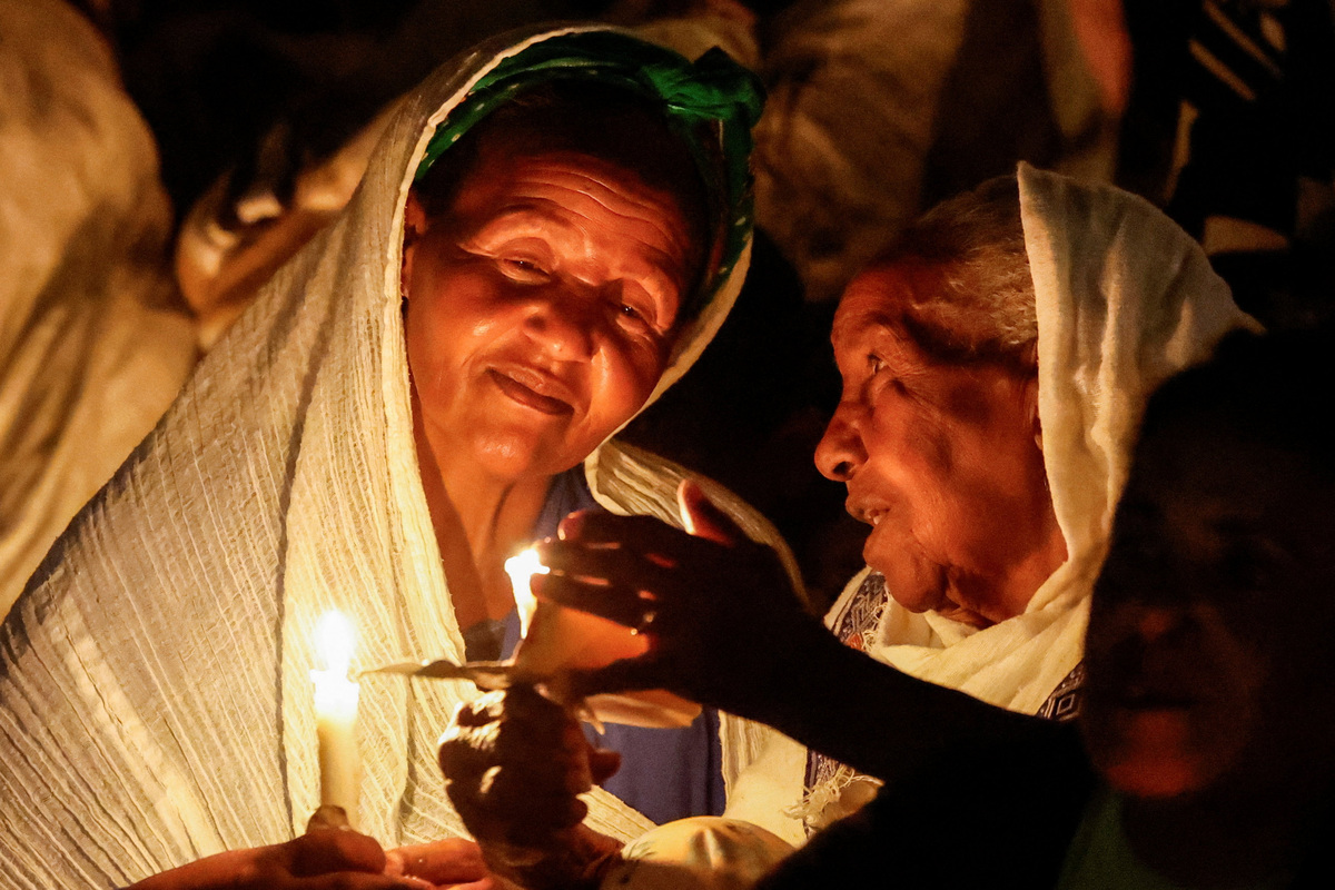 Women hold candles during a vigil ahead of Martyrs' Day, which commemorates the sacrifices made by Eritreans who lost their lives during the Eritrean War of Independence, in Asmara, Eritrea, June 19, 2026. Eritrea has long been isolated by the West, which views the East African country as among the most repressive in the world, while the government in Asmara has itself pursued a policy of political and economic seclusion. Despite its small population, Eritrea has gained new geopolitical importance this year, during the Iran war, because of its 1,000-km Red Sea coastline along a key shipping route between the Mediterranean and Asia. As conflict disrupted traffic through the Strait of Hormuz and attacks by Iran-backed Houthi militants threatened vessels near Yemen, Eritrean waters emerged as potentially one of the safest corridors for maritime trade. REUTERS/Monicah Mwangi