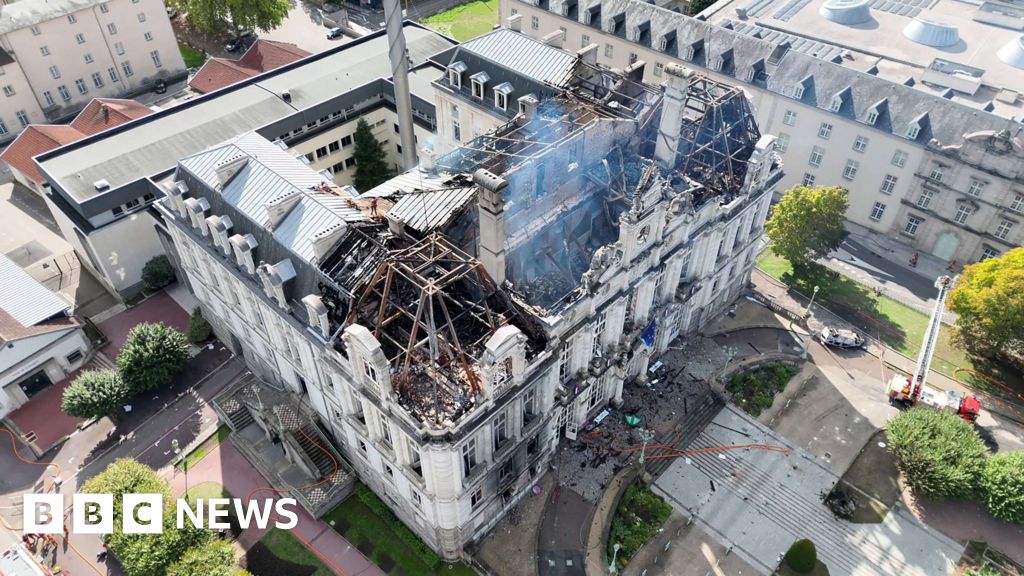 Suspect arrested after Limoges town hall set alight during disorder - French media - BBC
