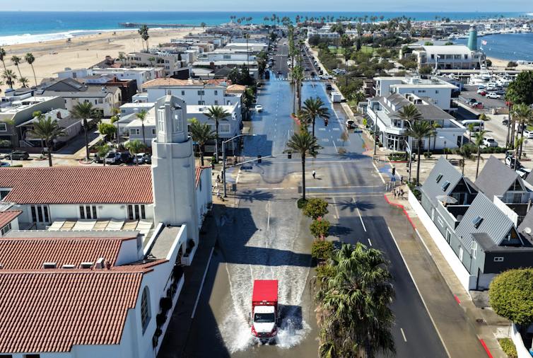 Flooded streets in a coastal town.