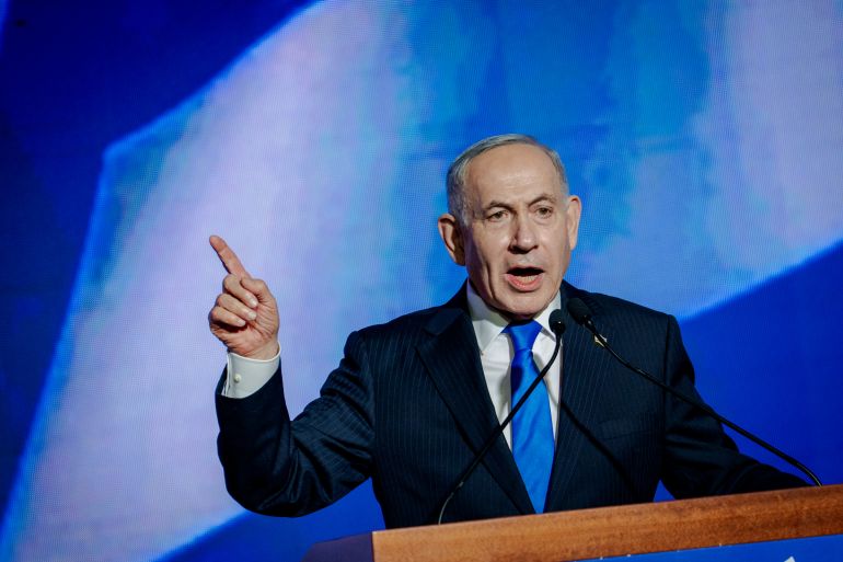 TEL AVIV, ISRAEL - SEPTEMBER 17: Israeli Prime Minister and Likud party leader Benjamin Netanyahu speaks at the lectern to supporters during a party campaign rally at Expo Tel Aviv on September 17, 2026 in Tel Aviv, Israel. The right-wing Likud party, led by Prime Minister Benjamin Netanyahu, is seeking to retain power in Israel's upcoming national election, due to be held on October 27. Recent polling suggests Likud and the ruling coalition face a tight race against opposition blocs, with no clear frontrunner emerging in an increasingly fragmented political landscape. The election is the first to be held since Israel went to war in Gaza, Lebanon and Iran, in the aftermath of the Hamas terror attacks on October 7, 2023. (Photo by Erik Marmor/Getty Images)
