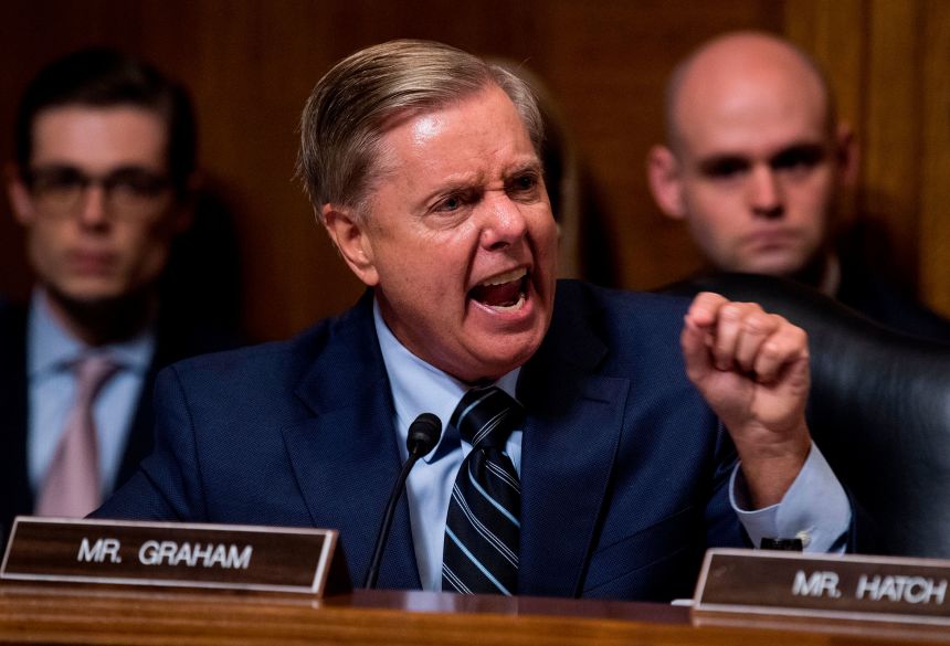 Sen. Lindsey Graham shouts during a Supreme Court confirmation hearing for then-Judge Brett Kavanaugh, in the Dirksen Senate Office Building on September 27, 2018.