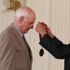 President Barack Obama presents the 2010 National Humanities Medal to Wendell E. Berry during a White House ceremony in 2011.