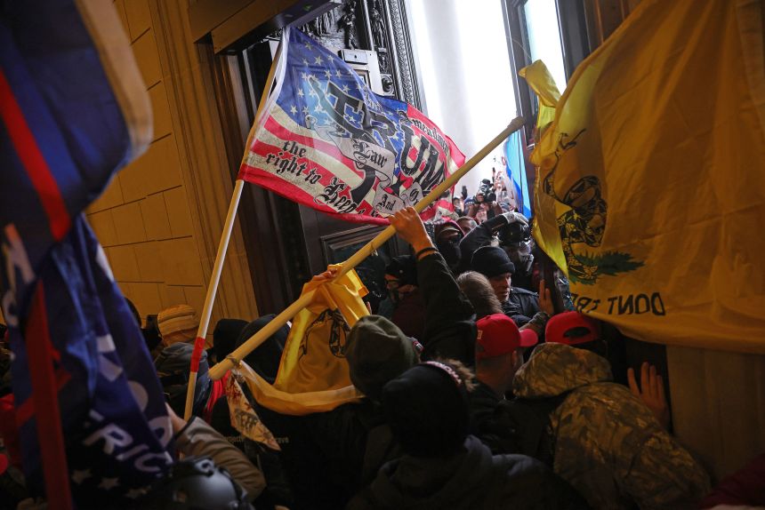 Protesters supporting President Donald Trump break into the US Capitol on January 6, 2021, in Washington, DC.