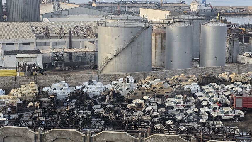 Damaged military vehicles, reportedly sent by the United Arab Emirates to support Southern Transitional Council (STC) separatist forces, following an air strike carried out by the Saudi-led coalition in the port of Mukalla, southern Yemen, on December 30.