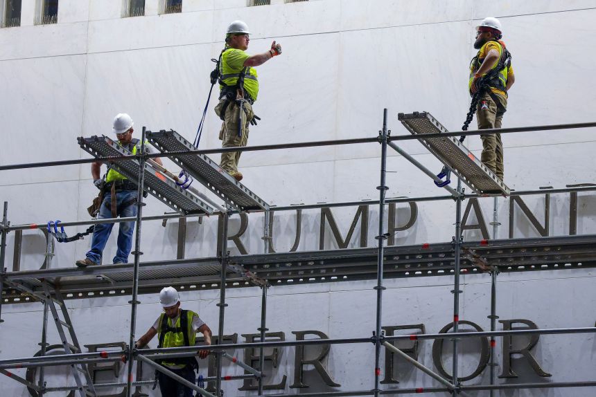 Construction crews build scaffolding outside The Kennedy Center, where Donald Trump's name is seen, on June 13, 2026 in Washington, DC.