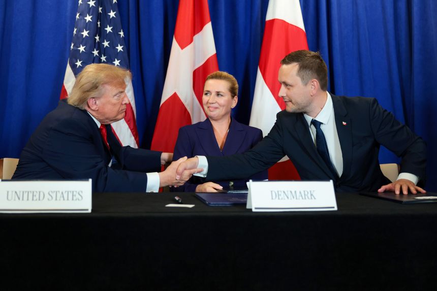 US President Donald Trump, Prime Minister of Denmark Mette Frederiksen and Prime Minister of Greenland Jens-Frederik Nielsen shake hands during the signing of a security pact between their countries during the 81st session of the United Nations General Assembly on September 22, 2026, in New York City.