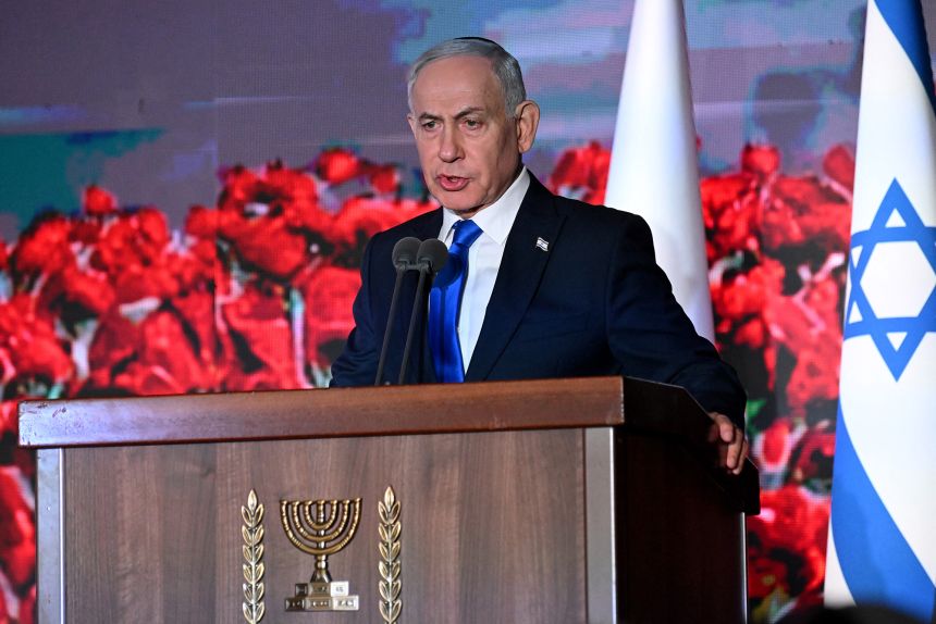 Israeli Prime Minister Benjamin Netanyahu speaks during a state memorial ceremony for the third anniversary of the October 7 attack, at Mount Herzl military cemetery in Jerusalem on October 5.