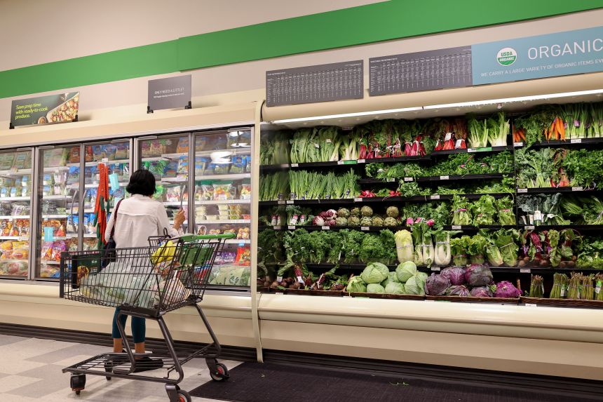 A shopper looks for items in a grocery store on October 14, 2026, in Miami, Florida.