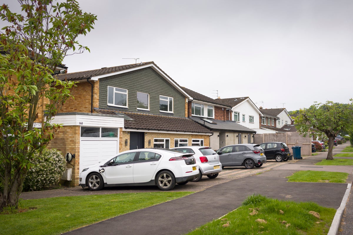 Architect struck off after bizarre neighbour dispute over 'phallic symbol' car