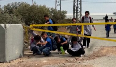 Palestinian children crawl under Israeli military gates to get to school | Israel-Palestine conflict News