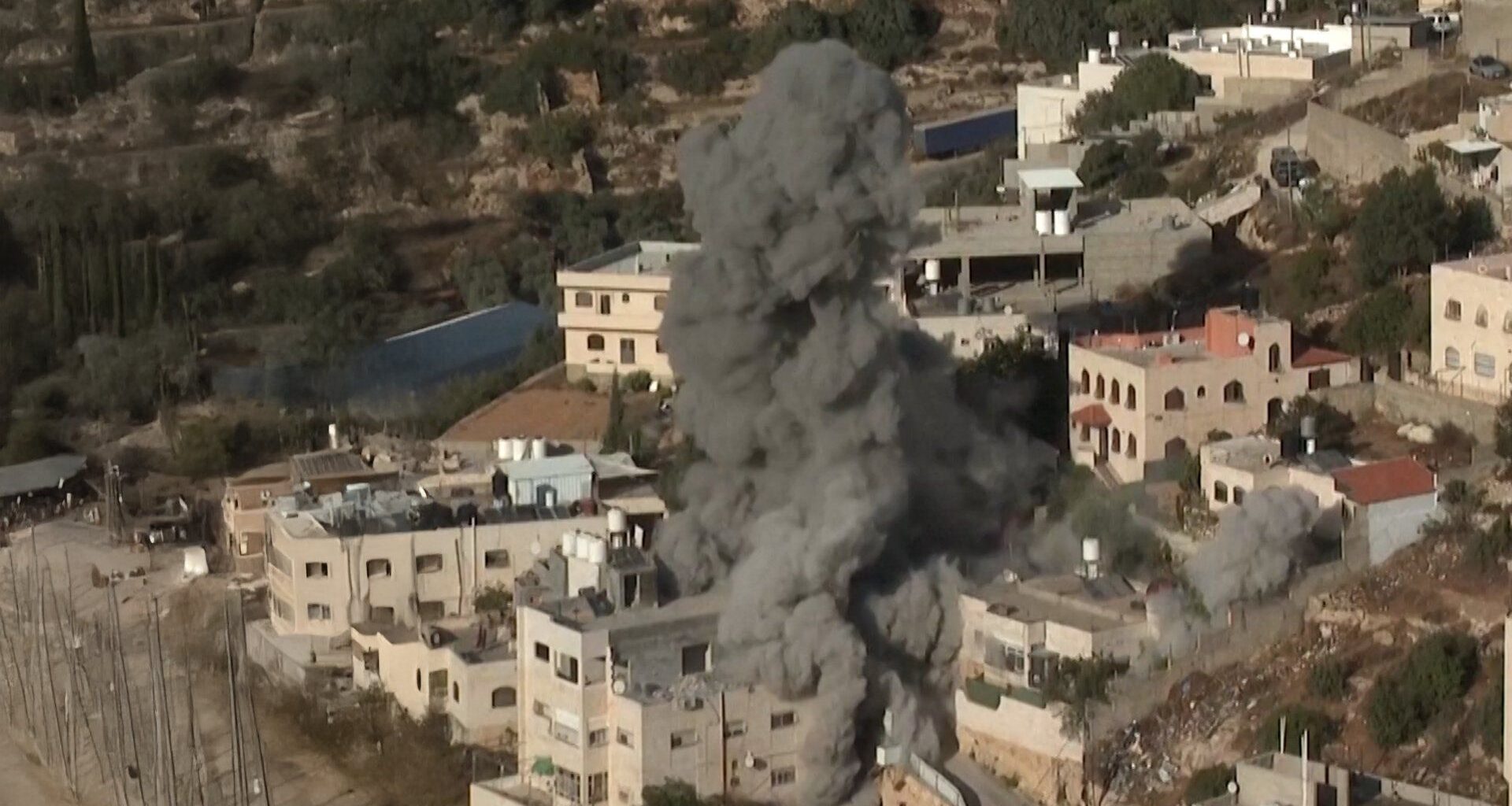 Israeli forces blow up homes of Palestinians accused of killing soldiers | Israel-Palestine conflict