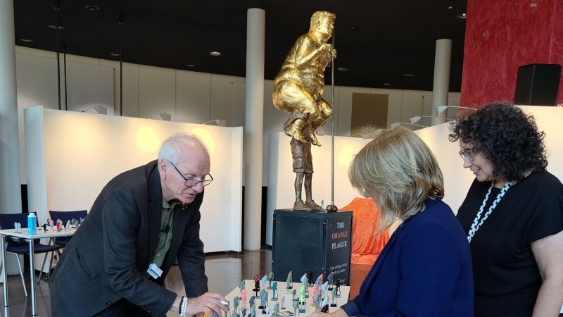 Golden naked Trump statue installed at European Parliament