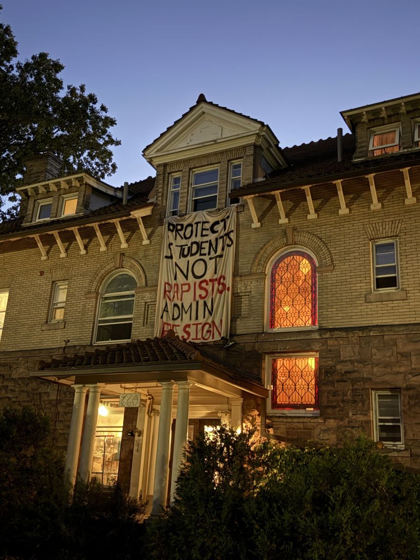 A banner reading “Protect students, not rapists. Admin resign” was seen hanging on Stewart Avenue Saturday evening.