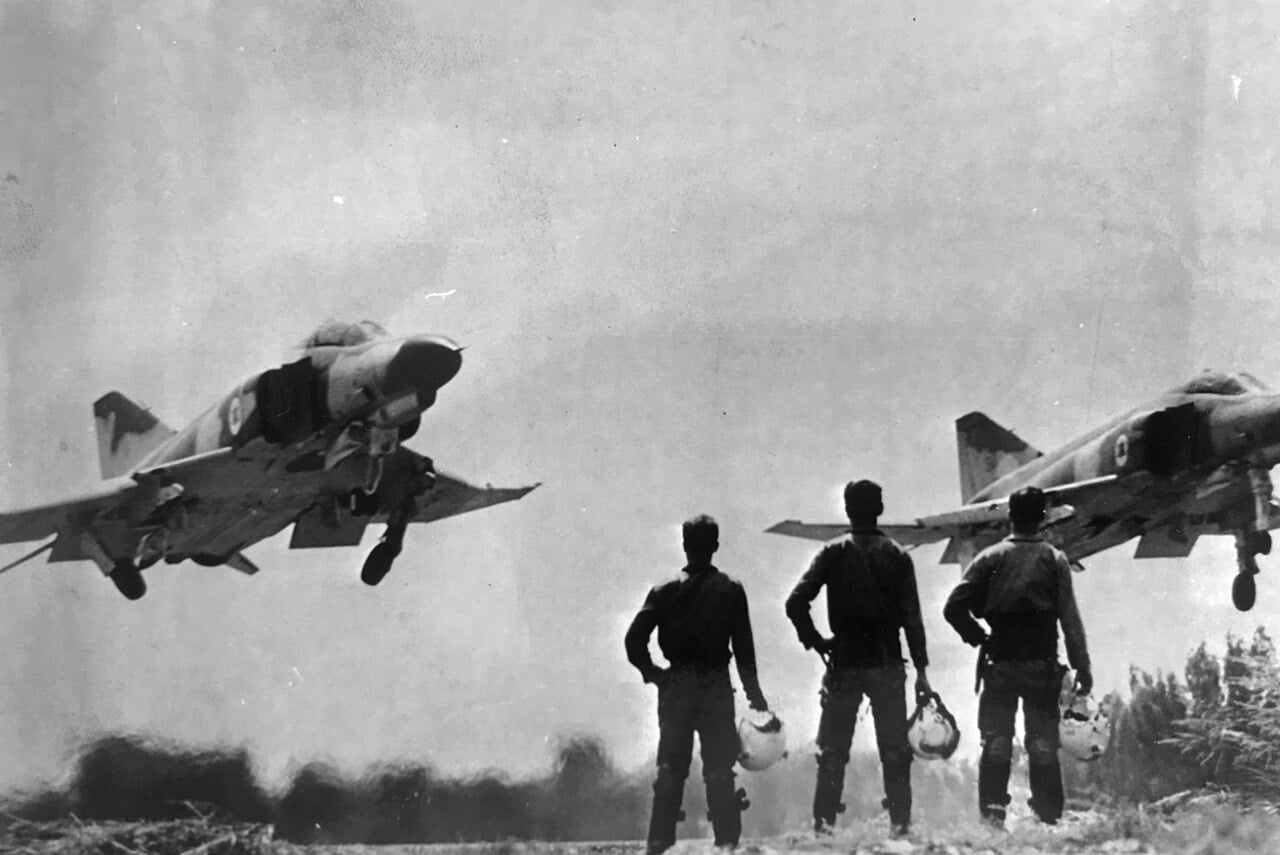 Israeli Air Force aircrew watch F-4 Phantoms take off during the Yom Kippur War, October 1973