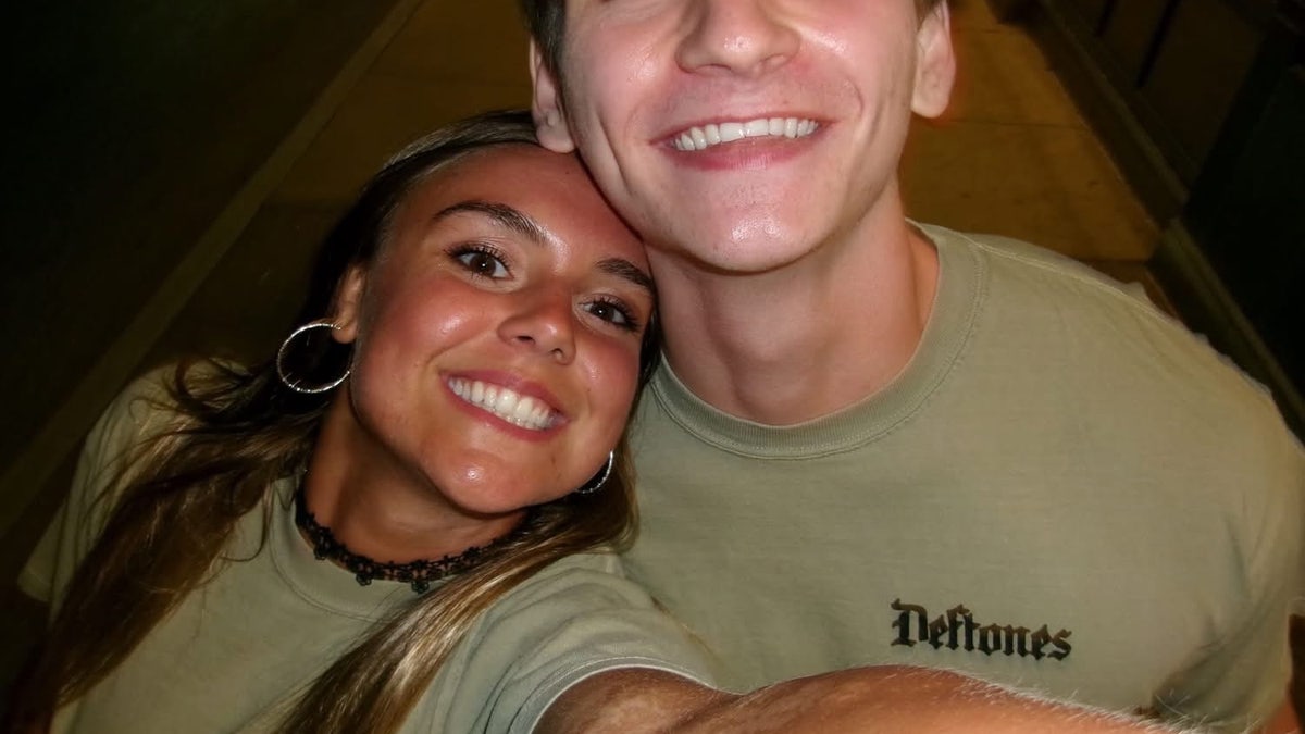 Jacob Fleig and fiancee smiling in selfie.