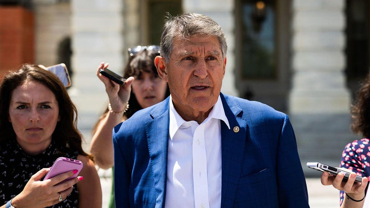 Sen. Joe Manchin walks away from the U.S. Capitol in Washington, D.C.