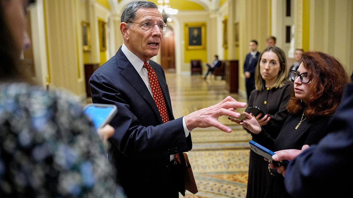 Senate Majority Whip John Barrasso speaking to reporters at the U.S. Capitol.