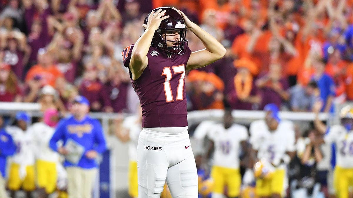 John Love reacts after missing a field goal at Lane Stadium.