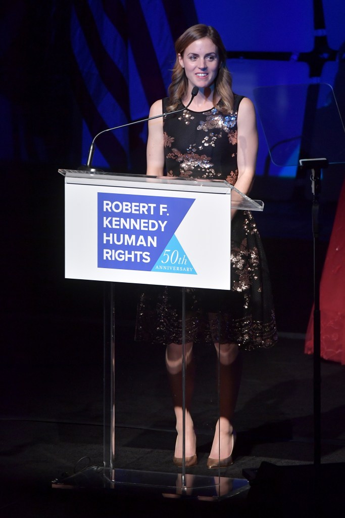 Kyle Kennedy Kerr speaks onstage at a podium during the Robert F. Kennedy Human Rights Ripple Of Hope Awards.