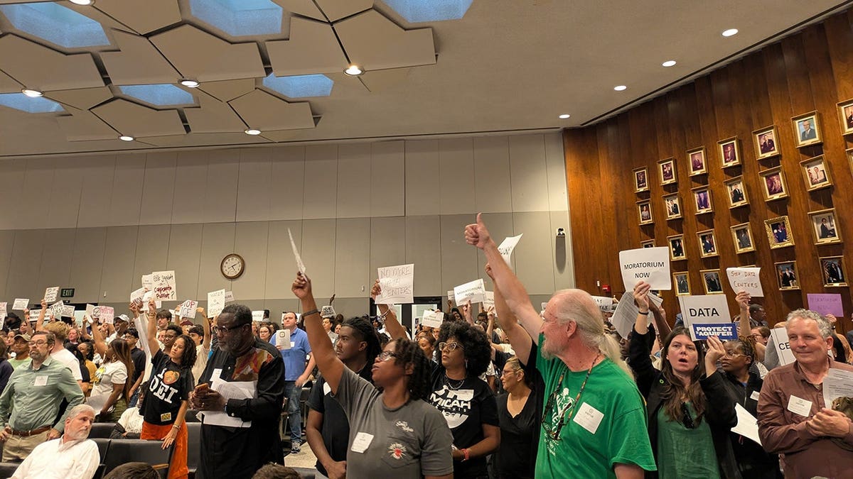 Residents gather inside Memphis City Council chambers voicing support for a data center moratorium.