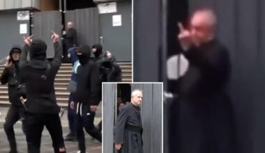Italian priest Giannicola Maria Simone gives middle finger to Milan rioters outside church