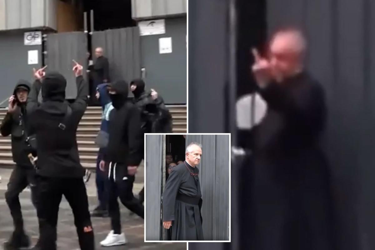 Italian priest Giannicola Maria Simone gives middle finger to Milan rioters outside church