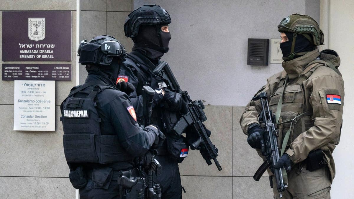 Members of Serbia's Gendarmerie stand guard at the entrance to the Israeli embassy in Belgrade on Oct. 28, 2026.
