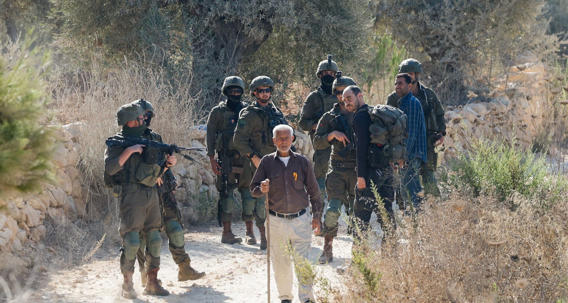 Israeli settlers attack Palestinian farmers during olive harvest | Occupied West Bank