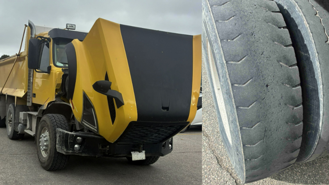 Dump truck stopped with multiple safety violations, 20 charges laid