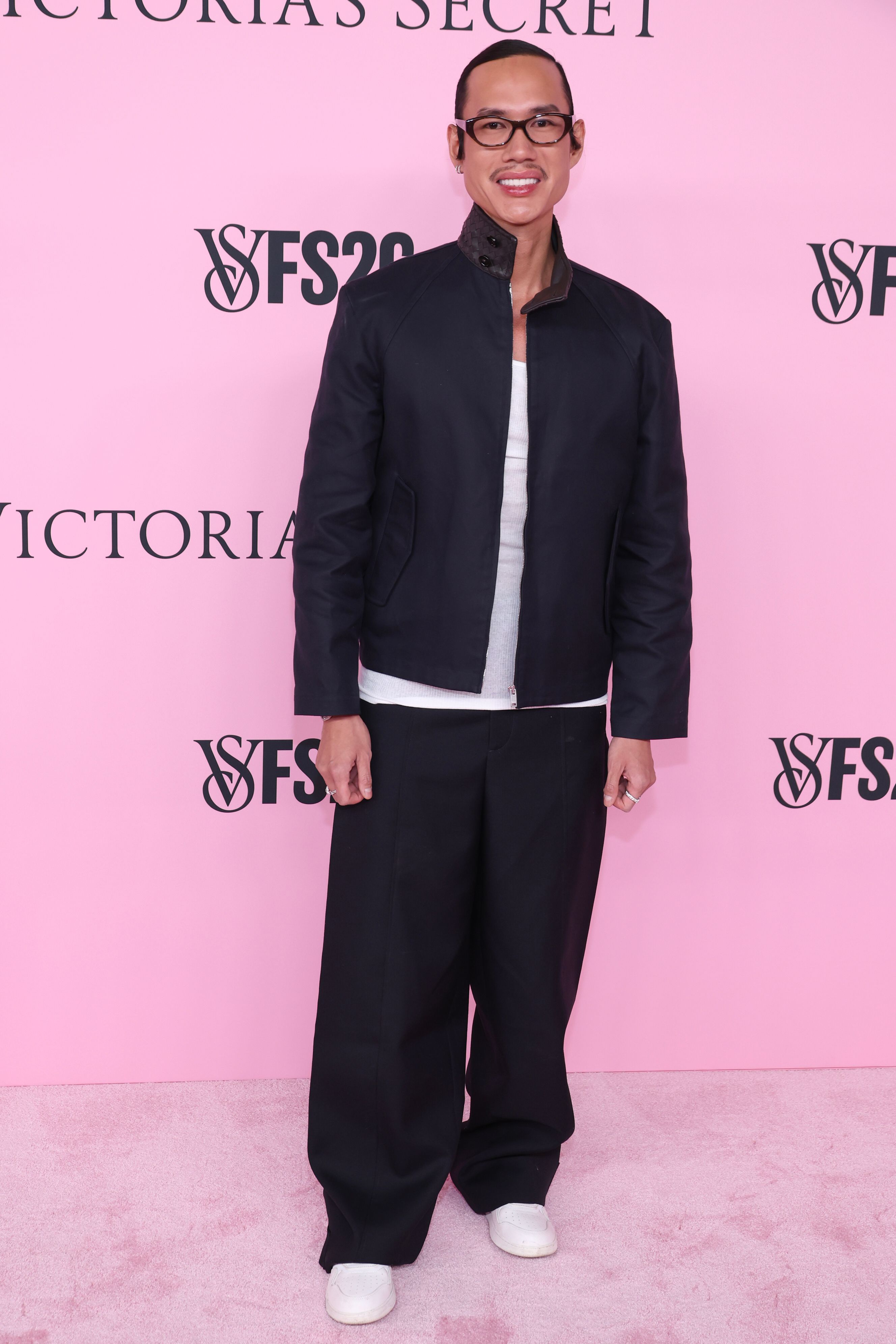Patrick Ta on the pink carpet at the Victoria's Secret Fashion Show.